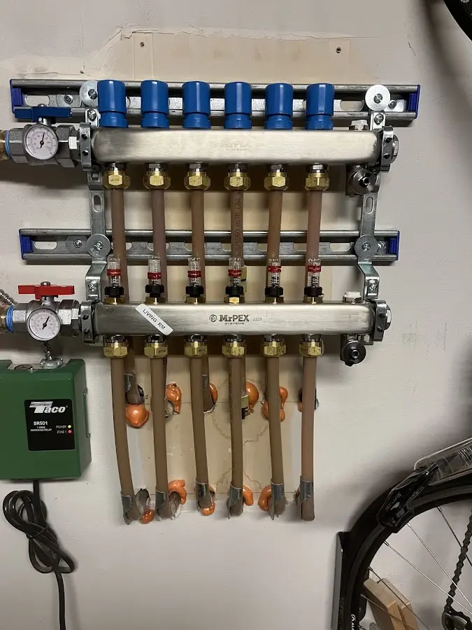 Plumber performing Water Heater Repair at a residential property in Pomona